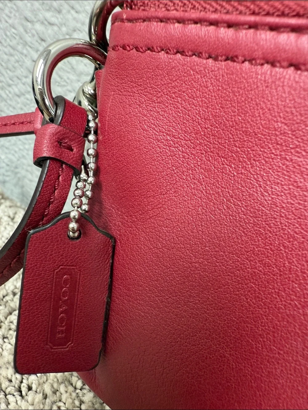 Coach sleek leather